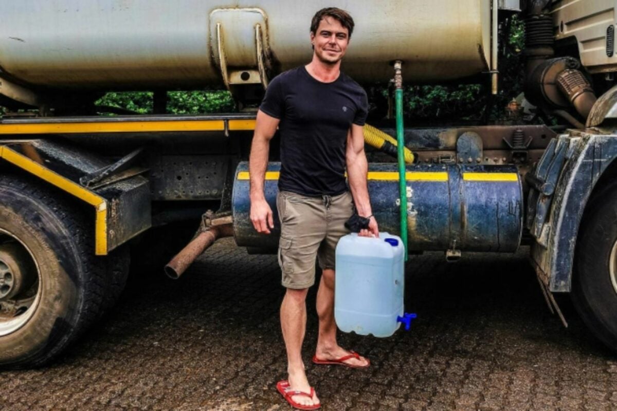 Bobby van Jaarsveld queues for water following KZN floods