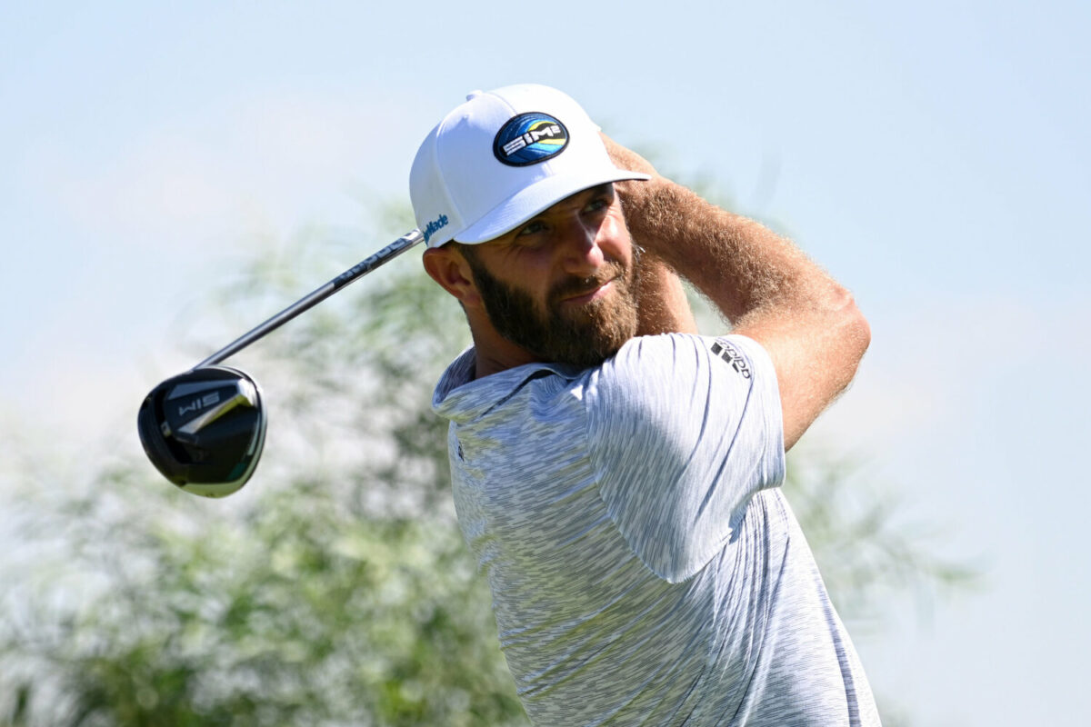 LIV Golf champion Dustin Johnson smiling all the way to the bank