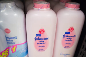 Johnson's baby powder products on the shelf.