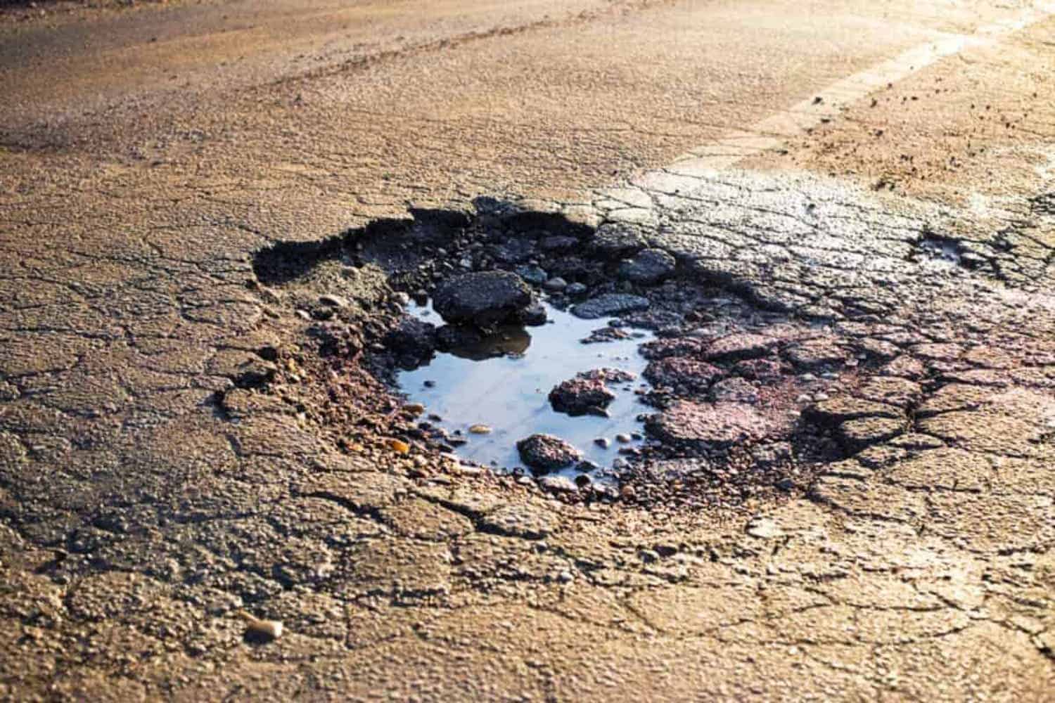 JRA warns motorist of the increasing potholes in the city.