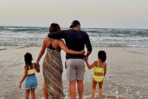 Soccer legend Itumeleng Khune and his family at the beach