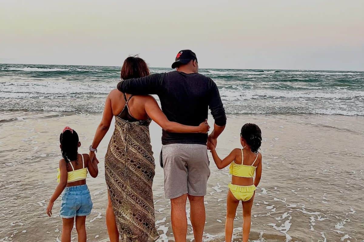 Soccer legend Itumeleng Khune and his family at the beach