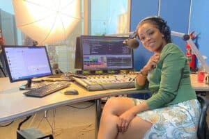 Jacinta Ngobese wearing headphones in studio