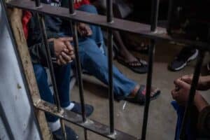 Prison population backlogged due to avoidable postponements of those awaiting trial.