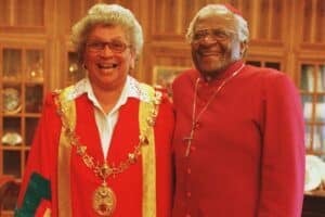 Theresa Solomon with Desmond Tutu. Solomon's funeral is today