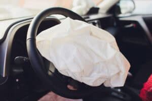 French car dealer charged over Takata airbag injury