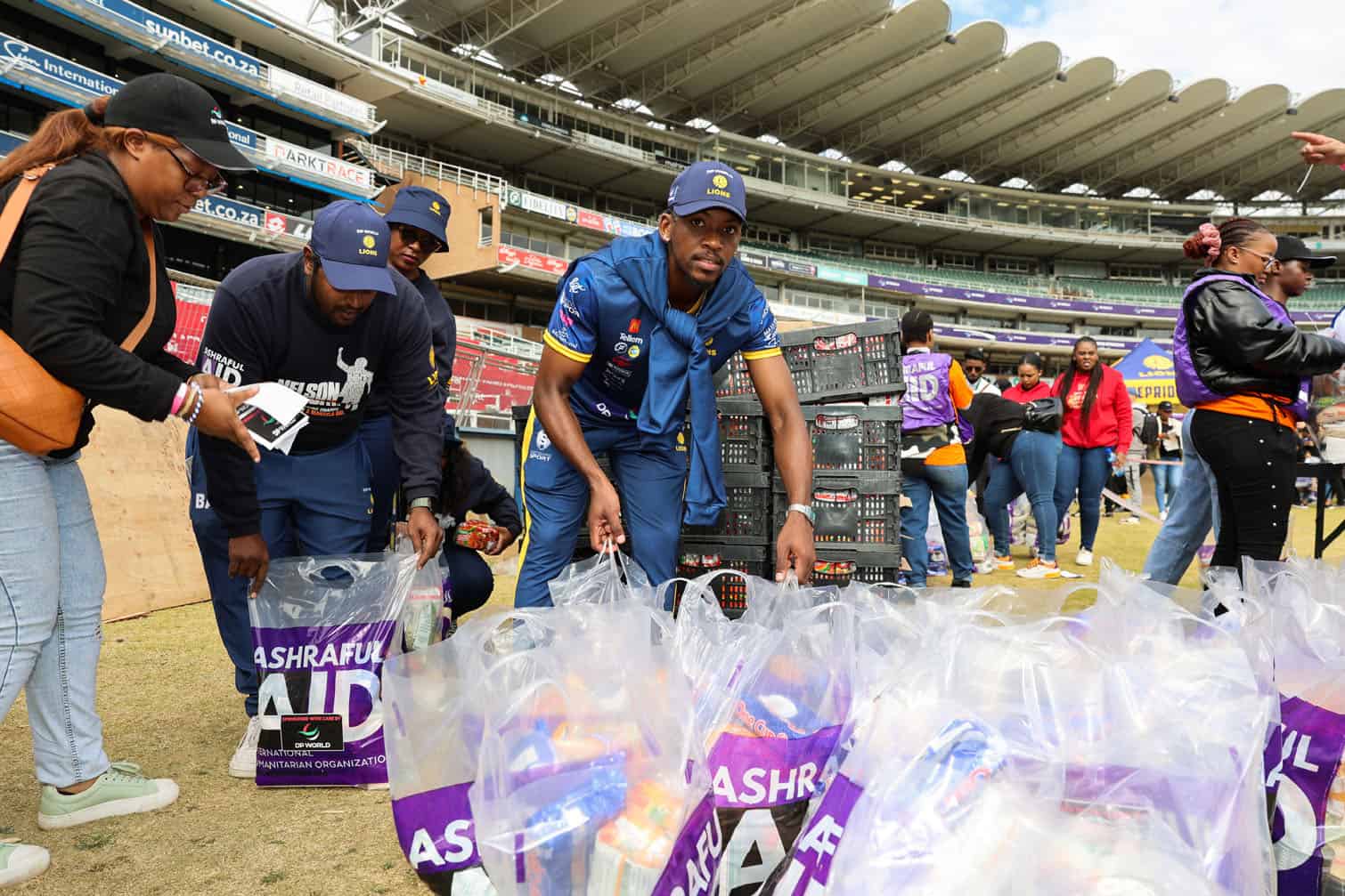 Lions Cricket Pride And Ashraful Aid Pack Food Parcels On Mandela Day At Wanderers Stadium
