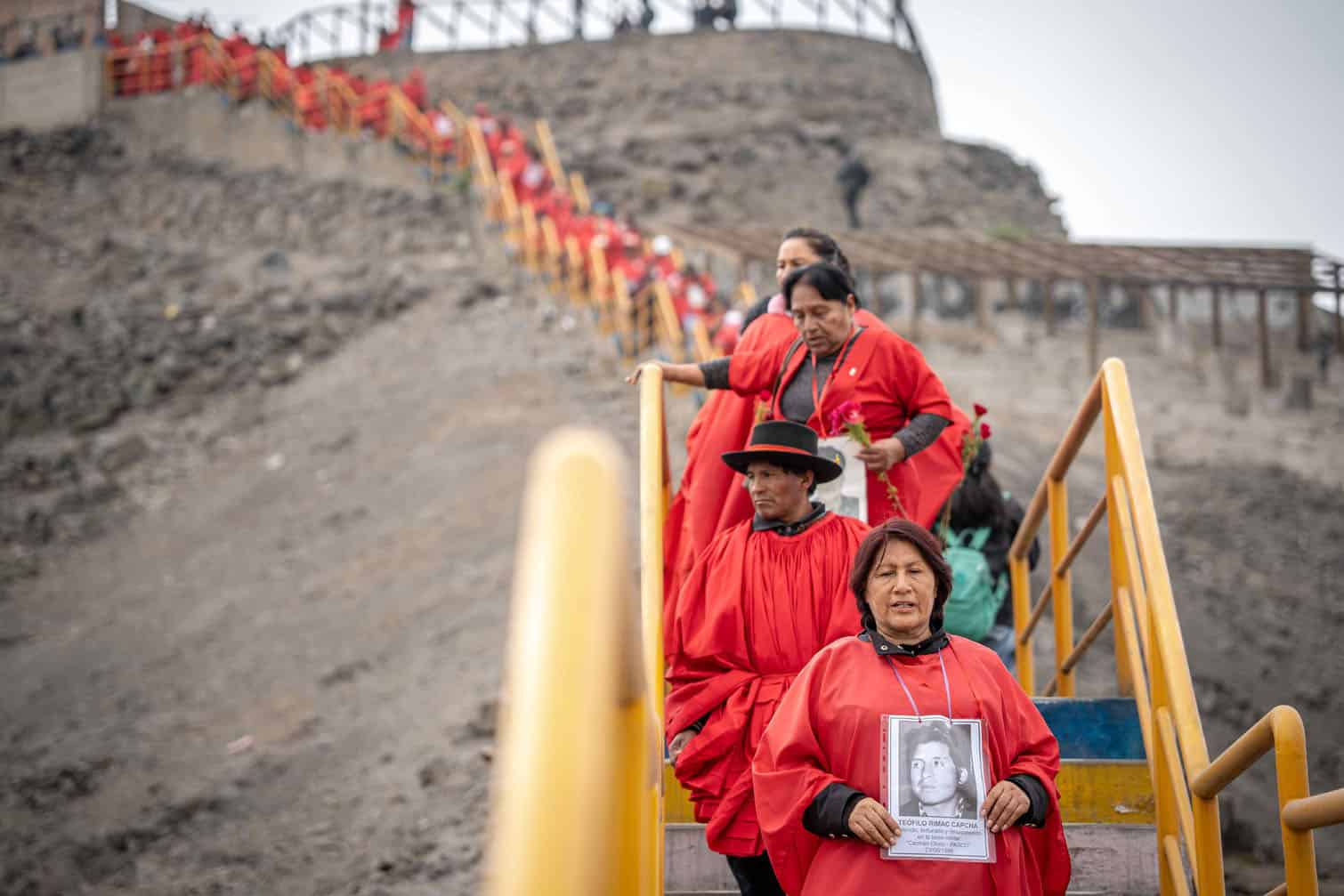 Relatives of victims of human rights abuses protest in Lima against the amnesty law