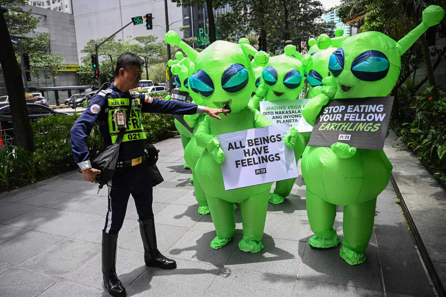 A security guard gestures