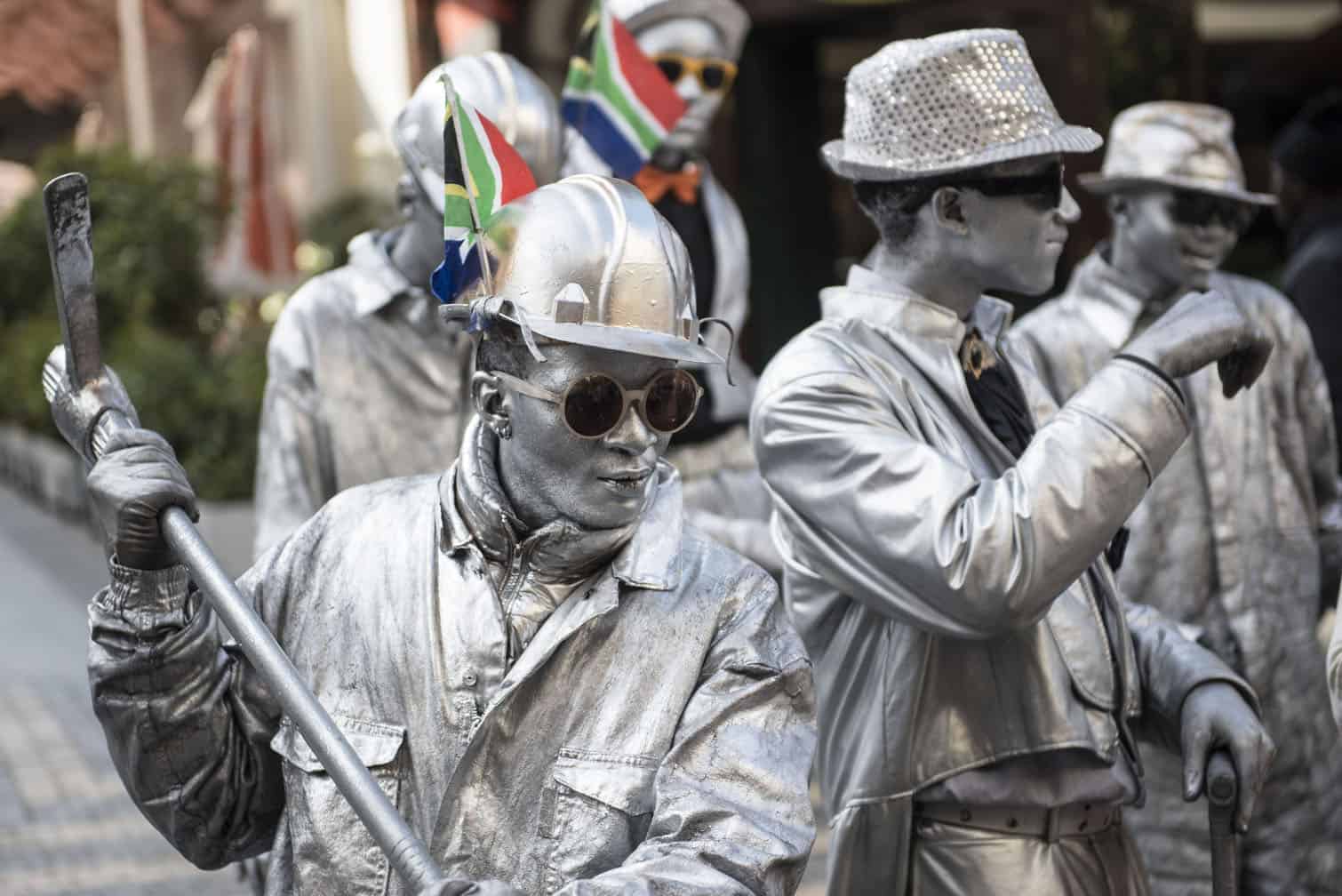 Silver-painted street performers
