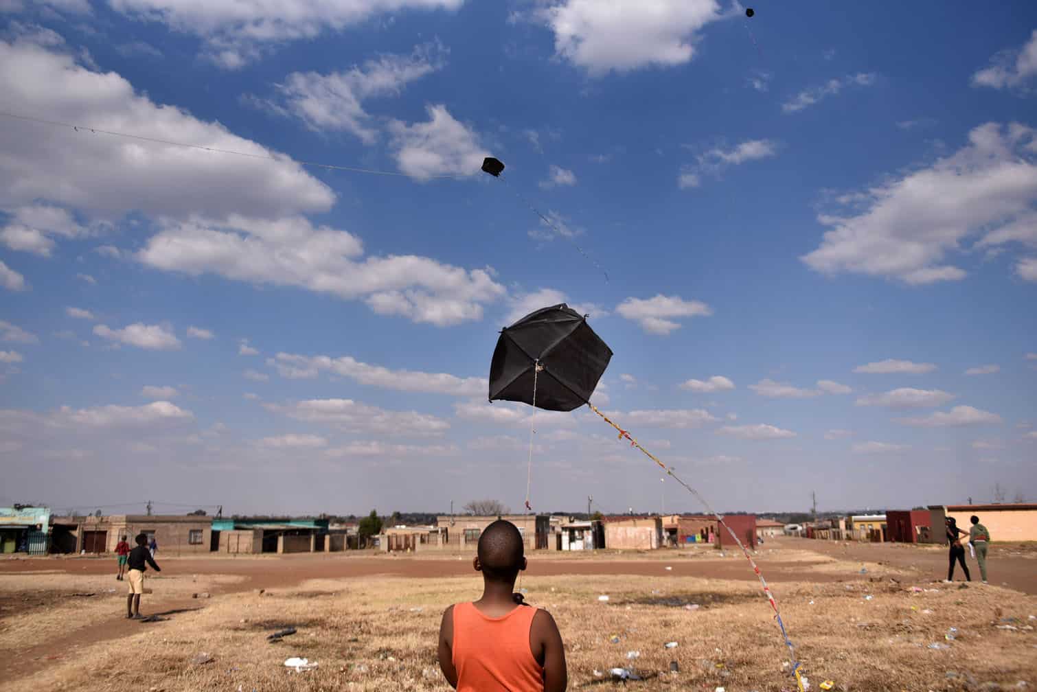 Bophelong children play with their kites