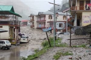 Flash flood washes out India Himalayan town, killing four