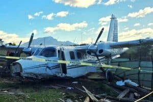 Pilot and passenger escape with minor injuries after aircraft crash in George