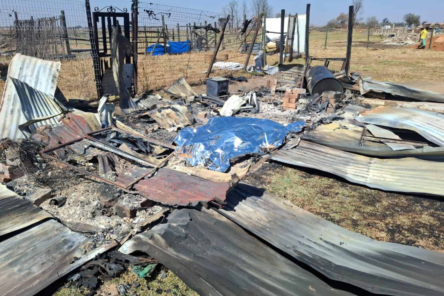 Charred body of man found under corrugated sheets in Katlehong
