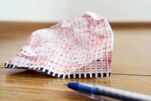 Lotto ticket and pen