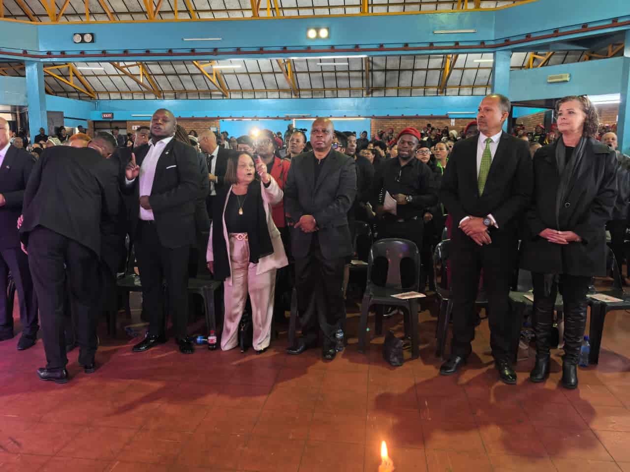 Politicians at a funeral