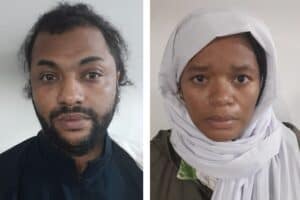 Thabo Bester and Nandipha Magadumana at a police station in Tanzania, shortly after their arrest. Photo: Faizel Patel/The Citizen