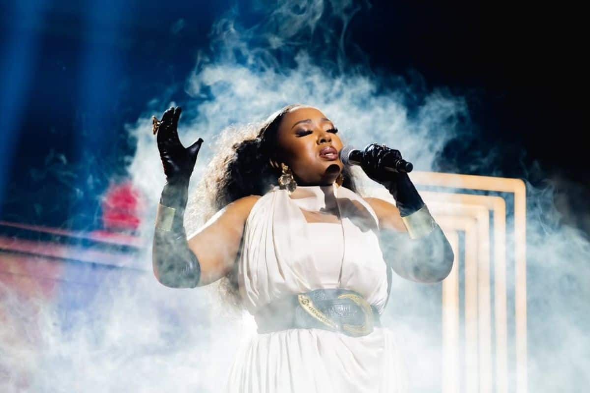 Brenda Mtambo singing on stage