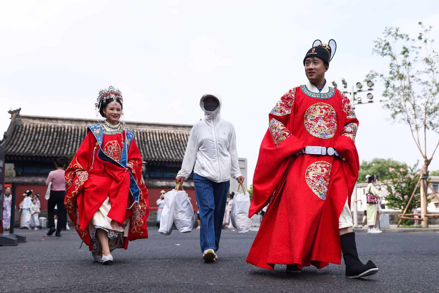 Tourists wear traditional attire in Beijing
