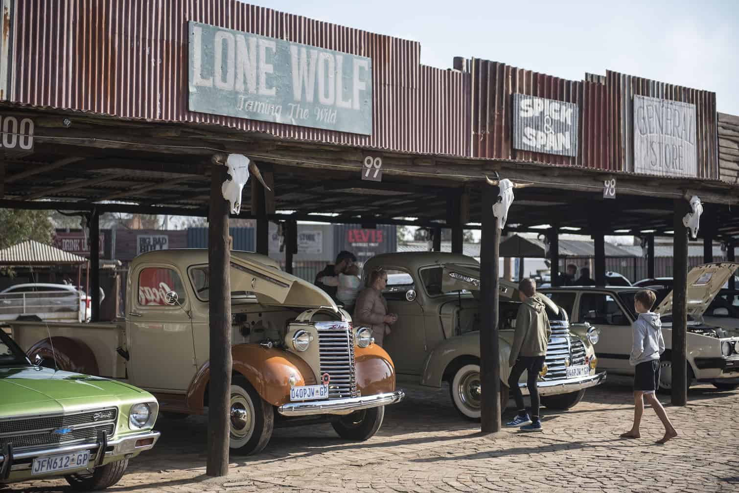 Visitors to Cowboy Town enjoy classic car show