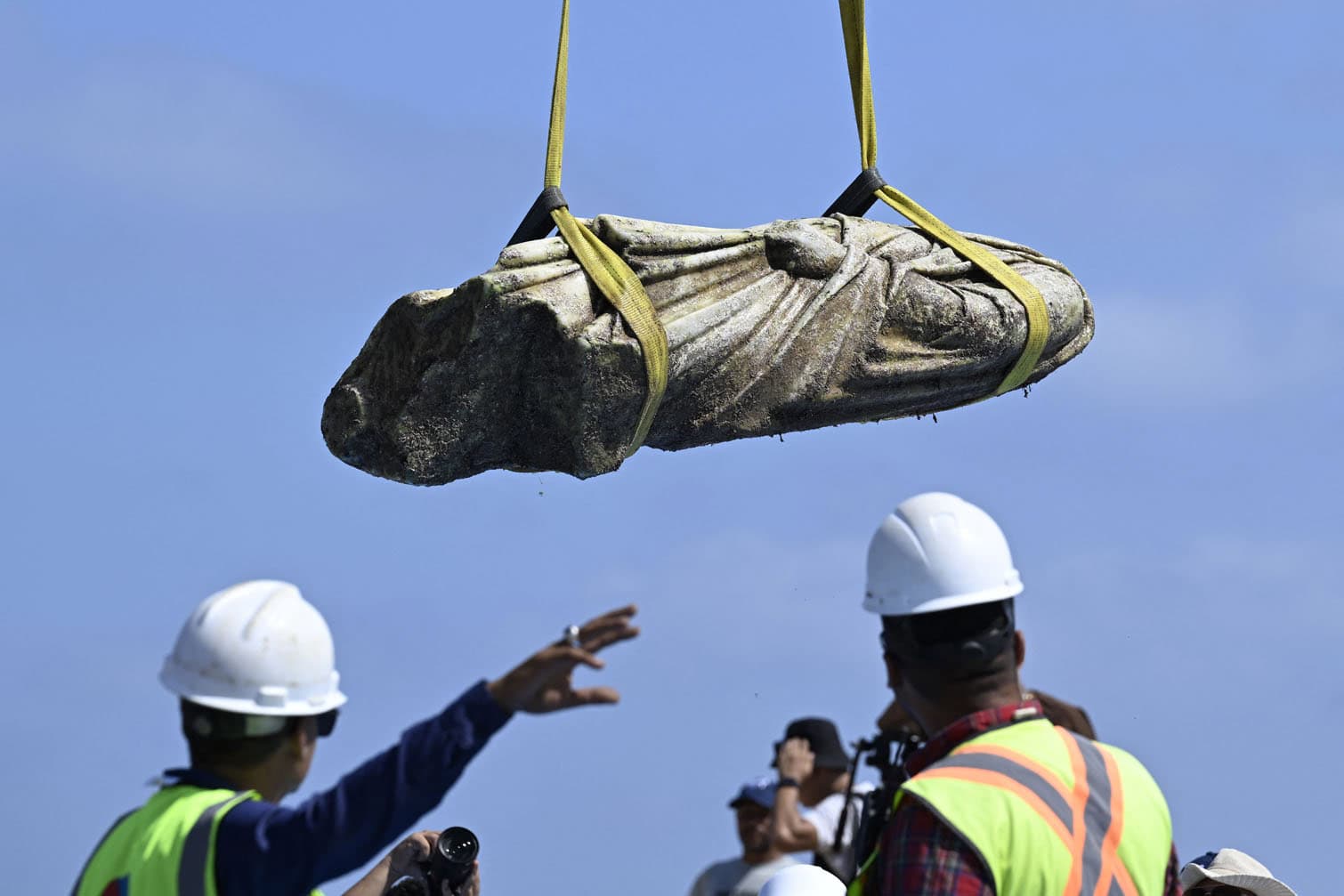 A crane pulls an artifact from the waters at Abu Qir bay in Alexandria