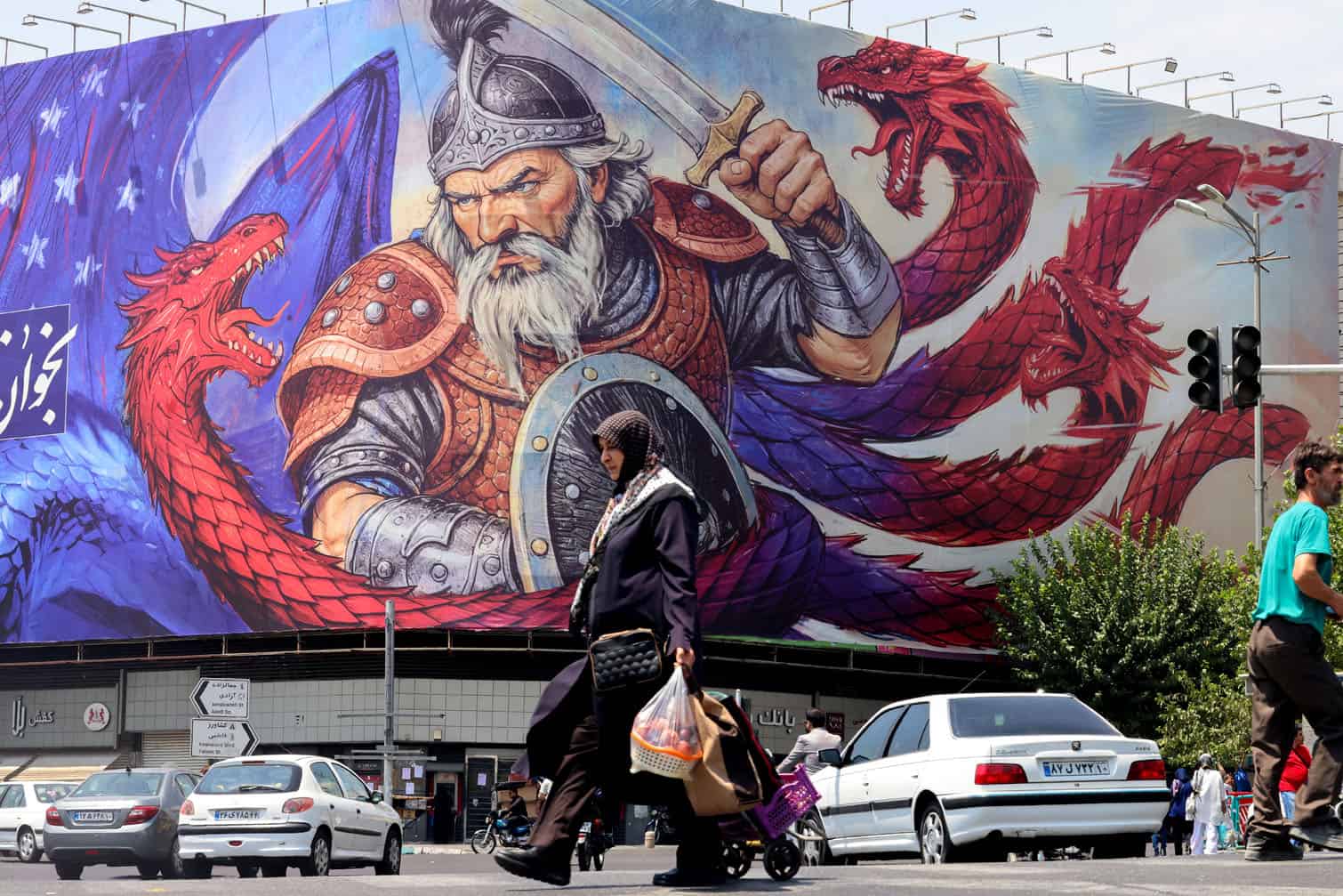 A woman walks depicting a scene from the Iranian national epic poem