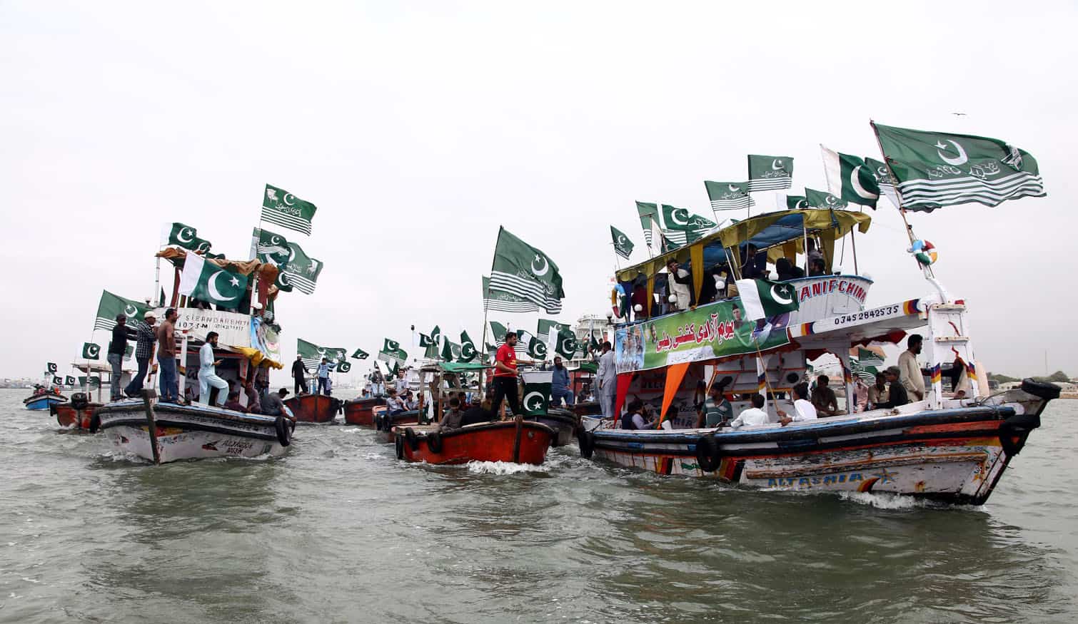 Boat rally ahead of Pakistan Independence Day in Karachi