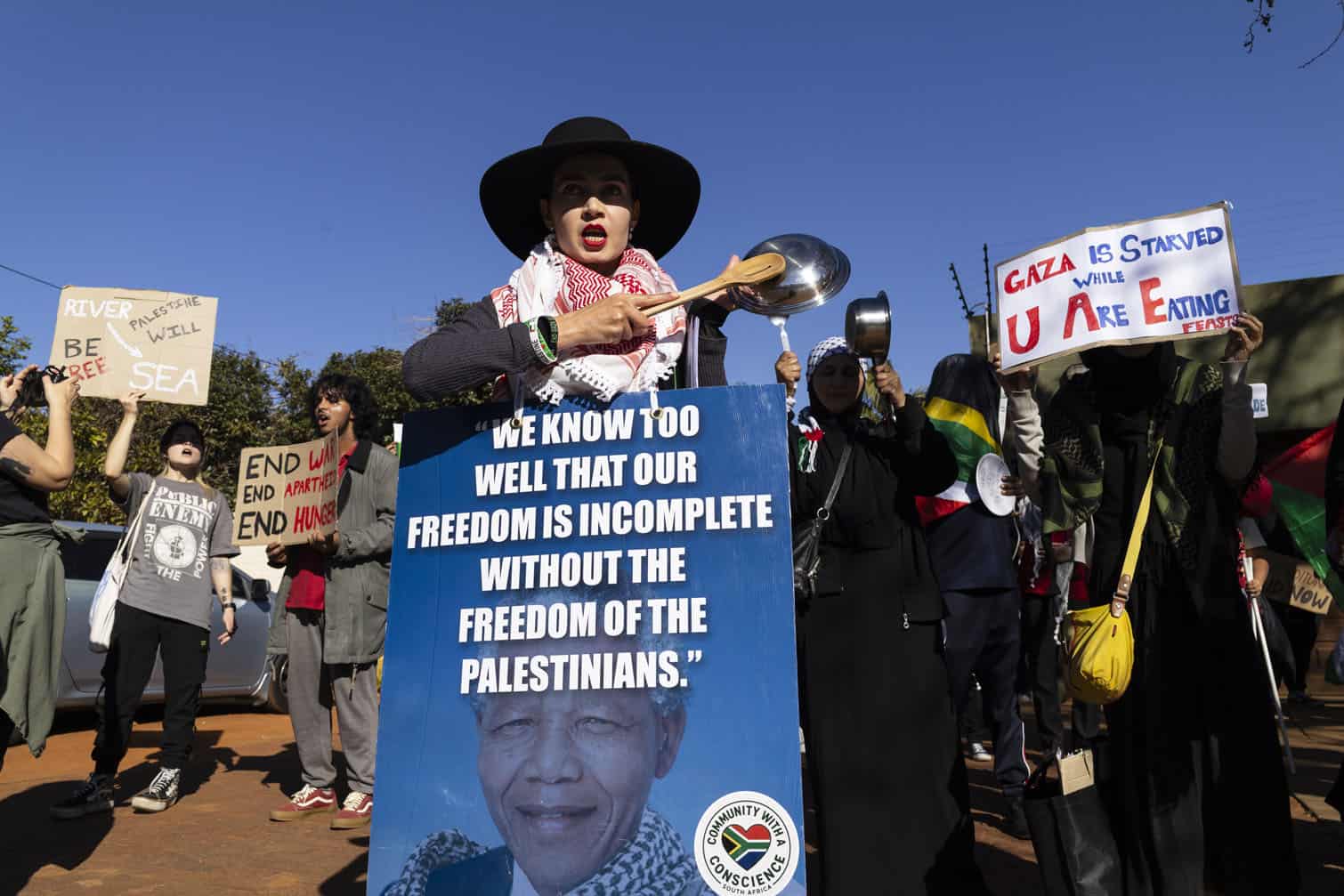 Protesters call for food aid to Gaza at UAE embassy in Pretoria
