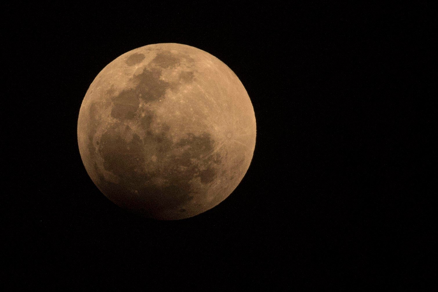 A partial eclipse of the moon is seen from Weltevreden Park