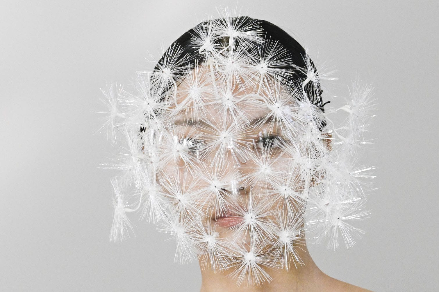 A model displays a creation from the Yes By Yesir