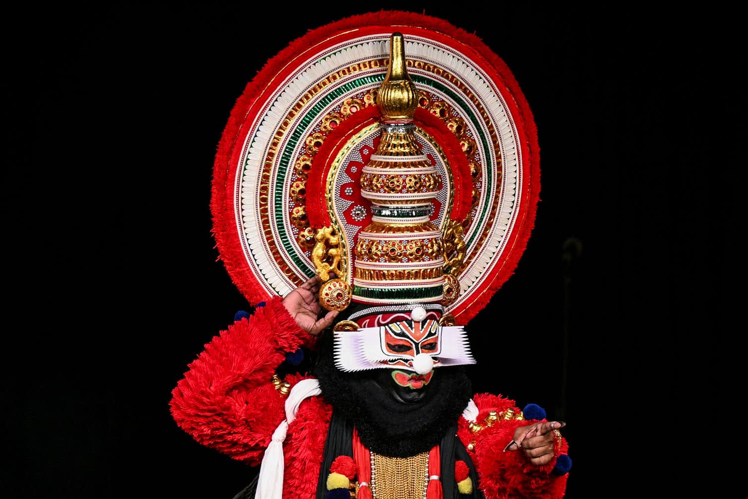 An artist performs Kathakali