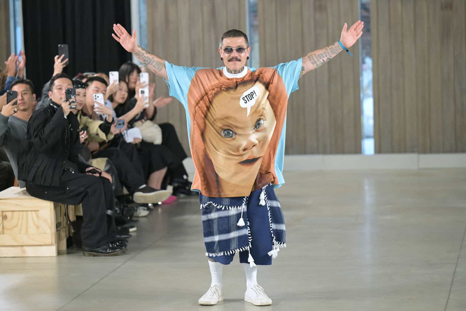Designer Adrian Appiolaza greets the audience