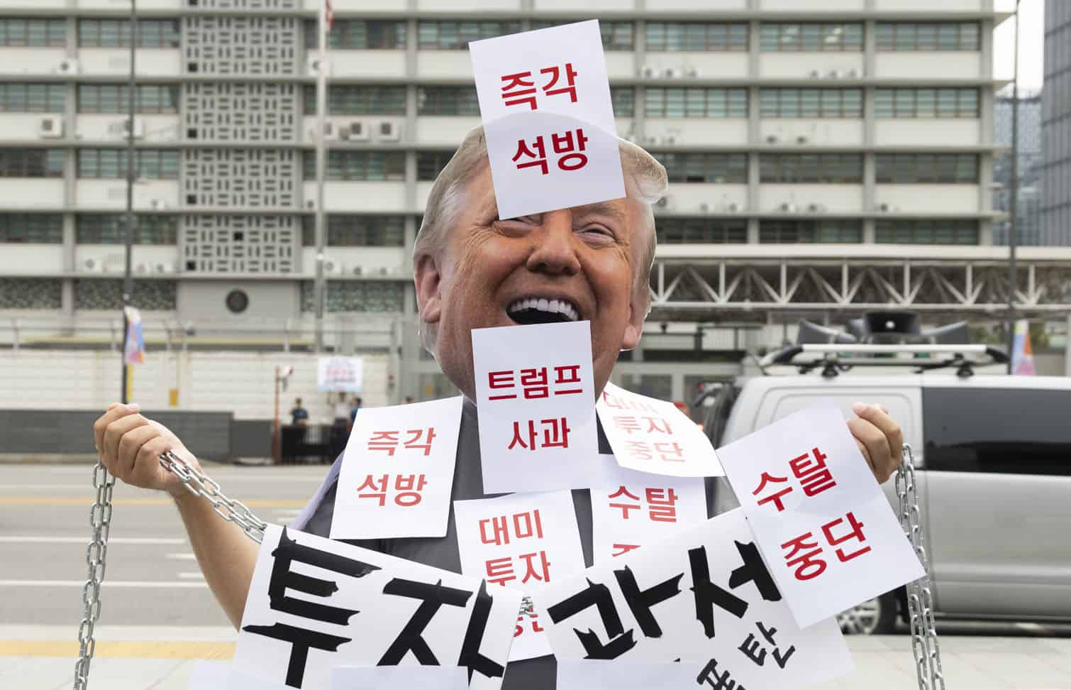 Protest in Seoul against Korean workers arrested in USA