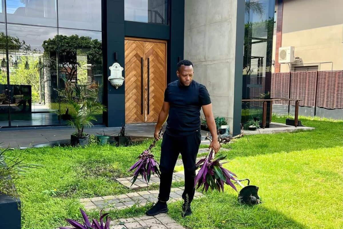 Kgolo DaGuru Mthembu outside his new home