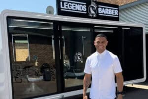 Man stands in front of Barber Pod