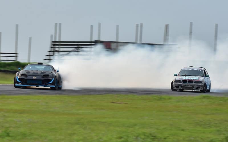 Two car drifting in tandem 