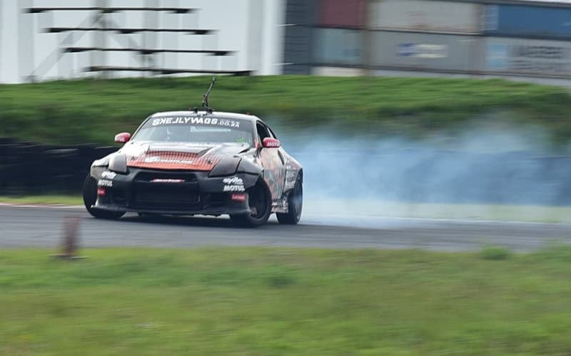 Nissan 350Z going sideway at Drift event