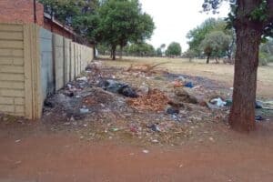 The corner at the park on Protea Avenue which has been turned into a dumping site.