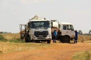 The drivers of two honey-sucker trucks dumping their contents into the manhole at approximately 14:20 on October 17.