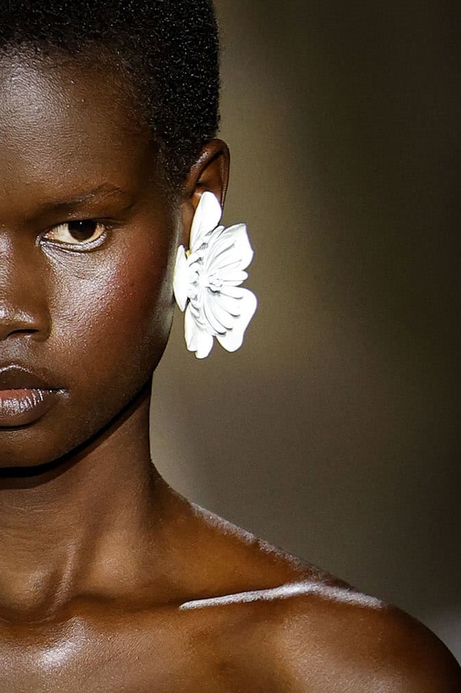 A model presents earings by Chloe