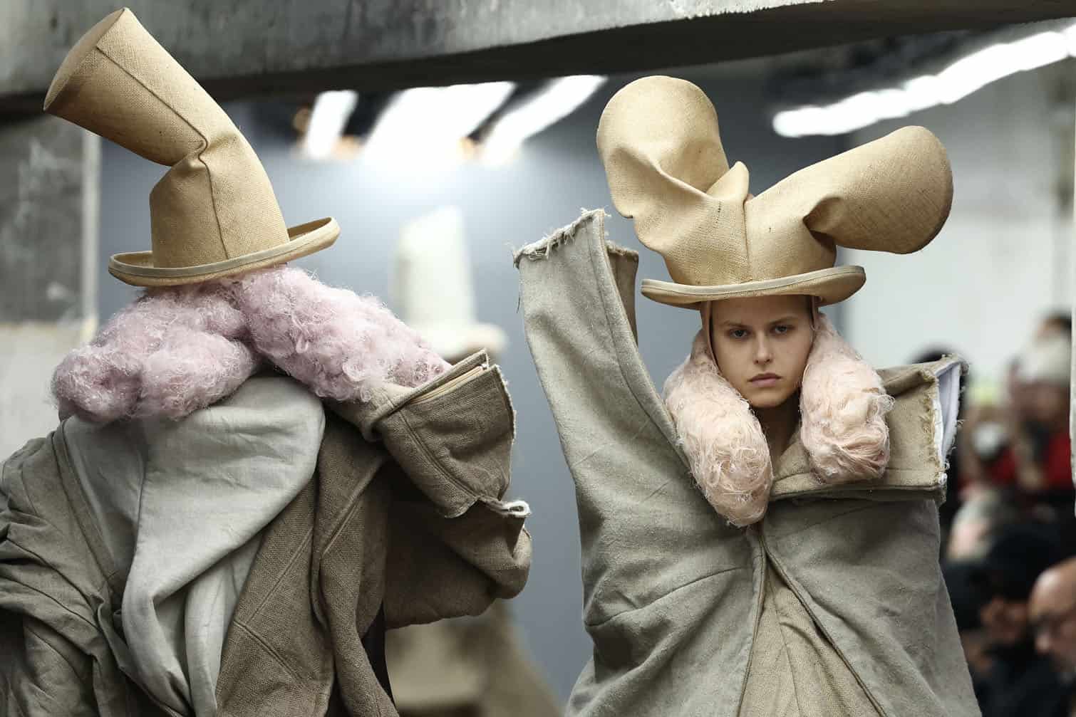 A model presents a creation by Comme des Garcon