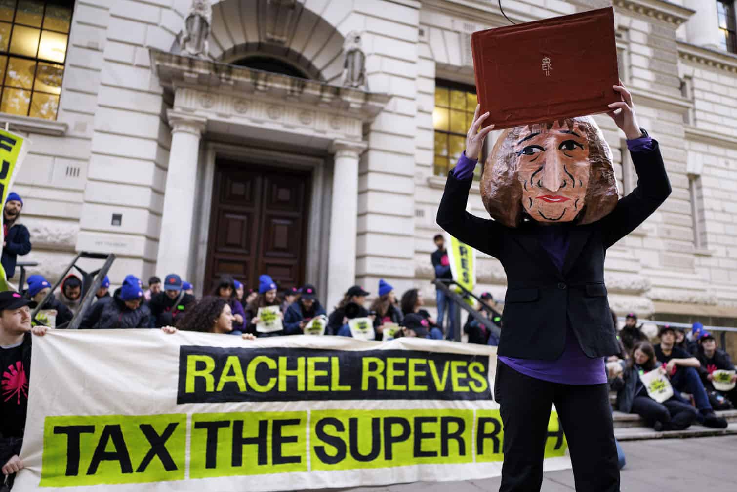 Green New Deal Rising holds a protest calling for wealth taxes on billionaires