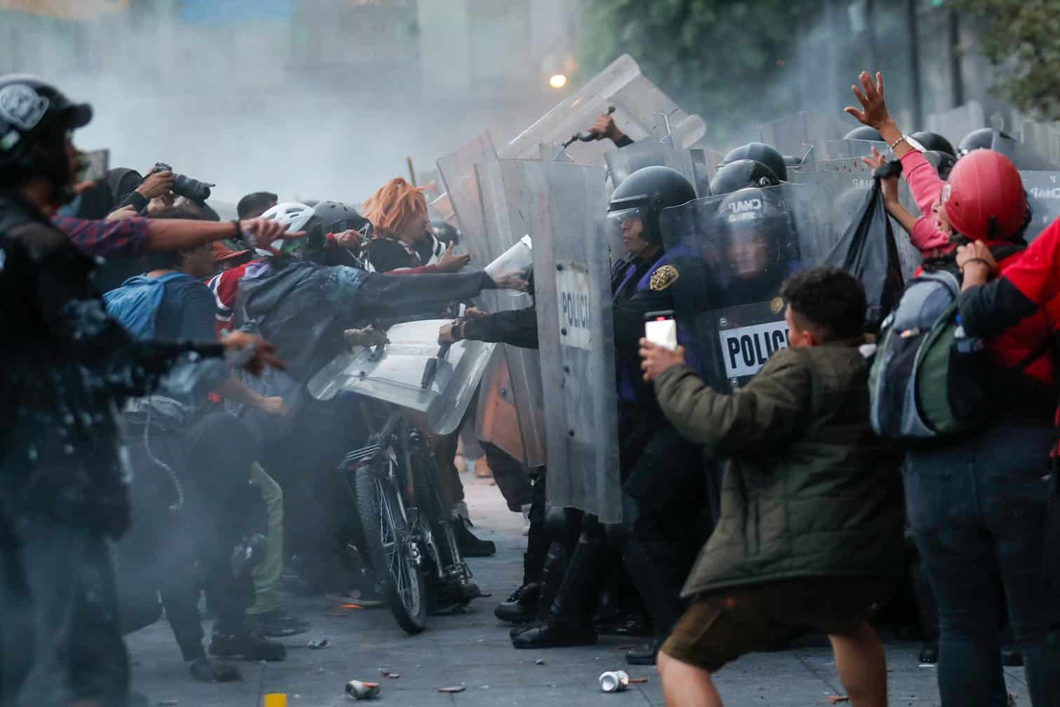 Protesters clash with police during Tlatelolco massacre anniversary march in Mexico City