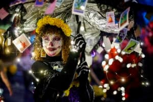 A woman dressed as a Catrina