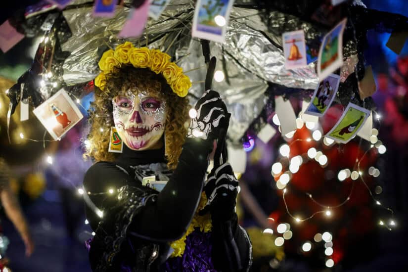 A woman dressed as a Catrina