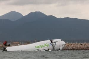 Cargo airplane skids off the runway at Hong Kong International Airport