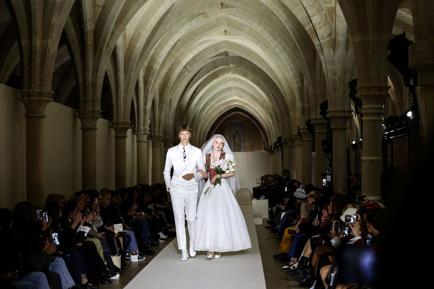 Models present wedding gowns