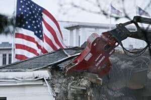 Heavy machinery tears down a section of the East Wing of the White House