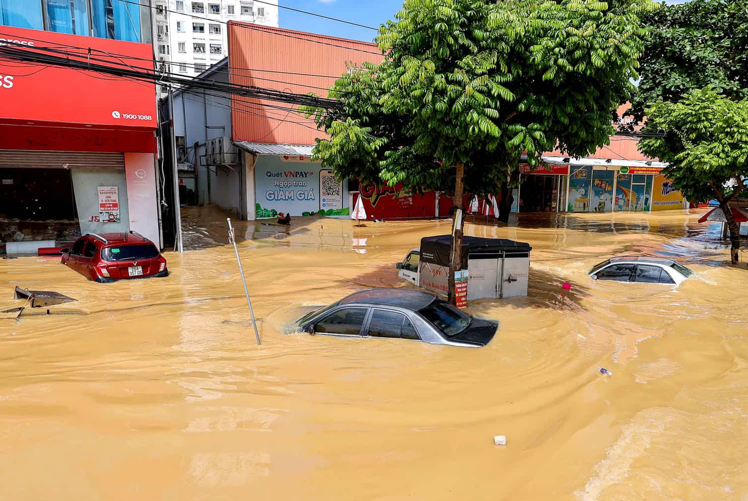 Cars are submerged in flood waters