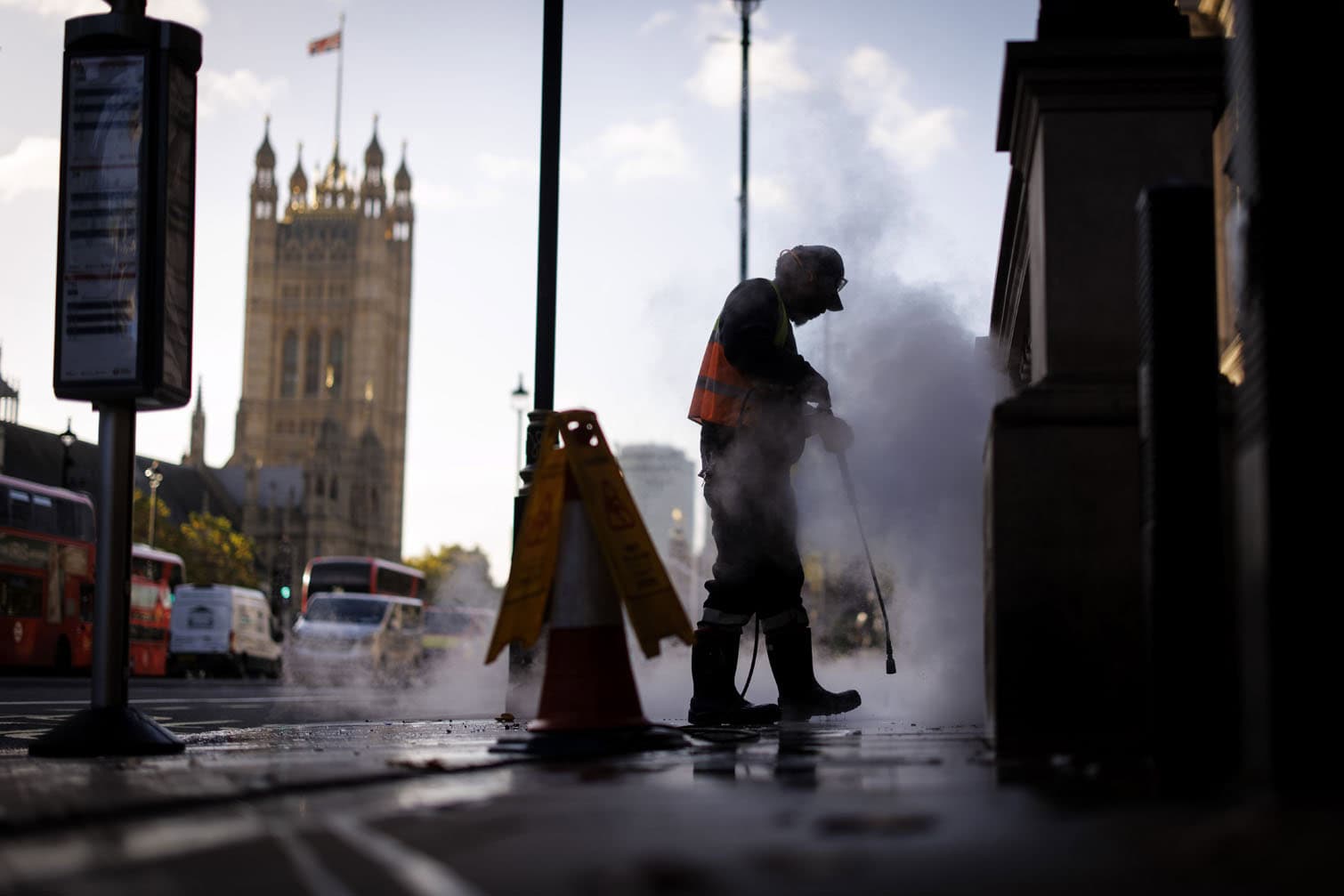 A Westminster City Council street cleaner at work in London
